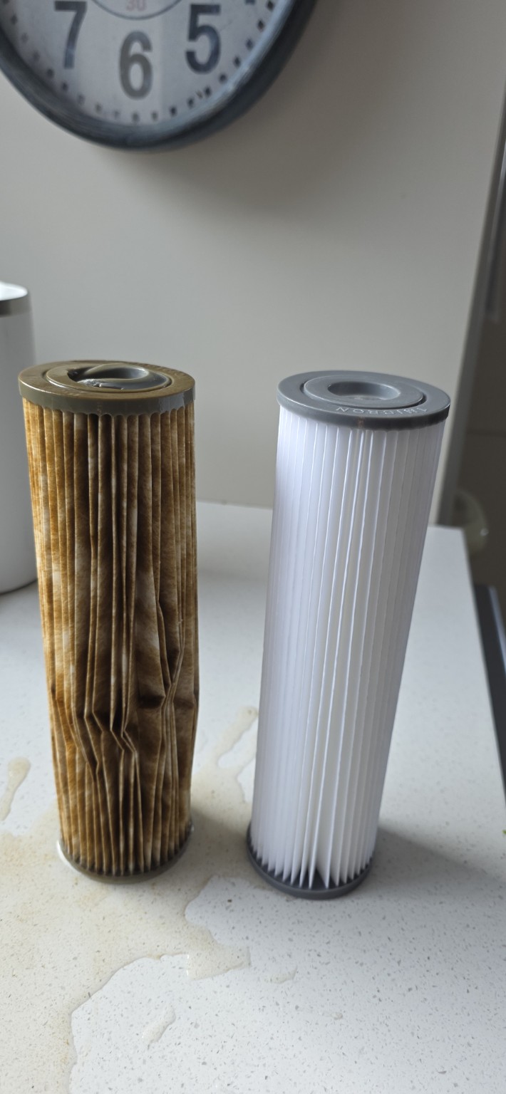Used and new water filter cartridges